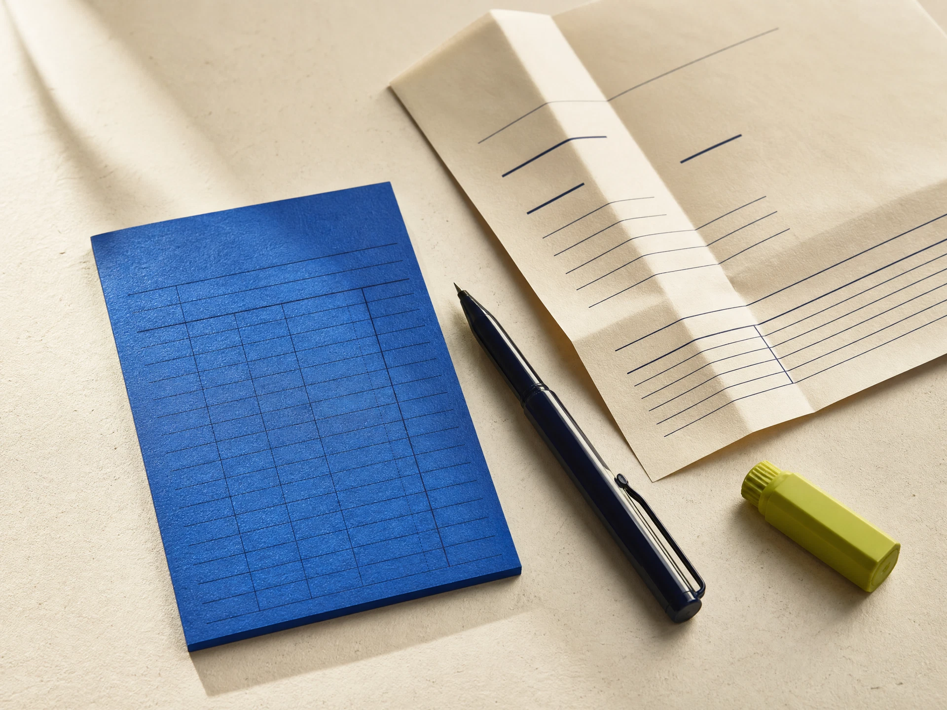 Cobalt finance materials arranged on a warm paper desk
